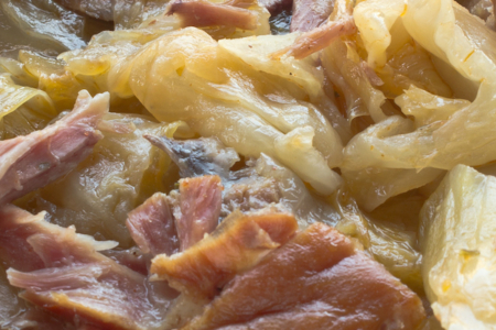 Sauerkraut with smoked pork meat in plate