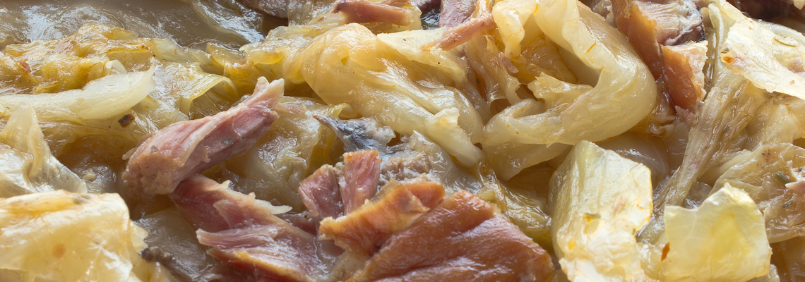 Sauerkraut with smoked pork meat in plate